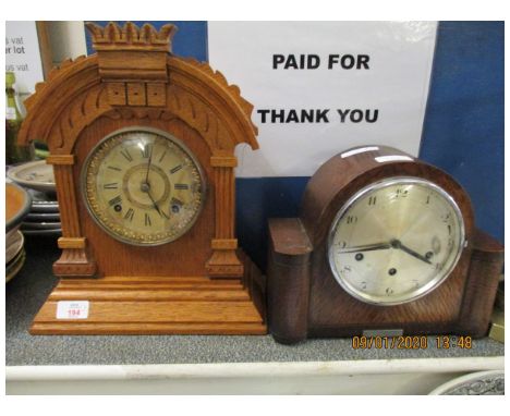 OAK CASED MANTEL CLOCK WITH ARABIC CHAPTER RING TOGETHER WITH A FURTHER OAK MANTEL CLOCK WITH SILVERED DIAL (2)  