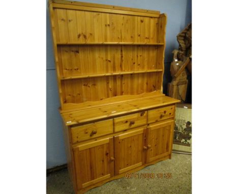 STAINED PINE DRESSER WITH TWO FIXED SHELVES WITH THREE DRAWERS OVER THREE PANELLED CUPBOARD DOORS WITH TURNED KNOB HANDLES  