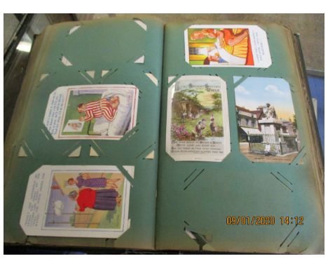 ALBUM CONTAINING VINTAGE POSTCARDS  