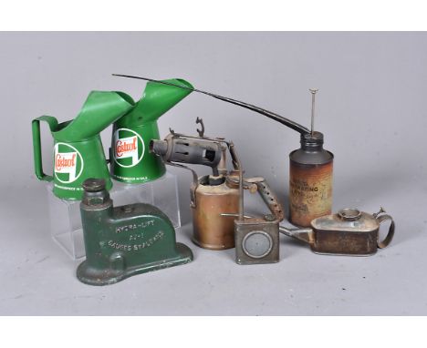 A collection of automotive related items, to include two small Castrol oil cans, Weber-Hydraulik Jack, other oil cans and jac