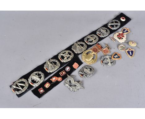 A collection of German Beret Insignia badges, to include Army Pioneer Troops, Signal Corps, Panzer, Army Special Forces, Ligh