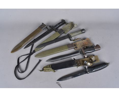 Three Spanish bayonets, comprising an M1964 CETME Model C, a CETME Model L and another, together with a US example, marked 19