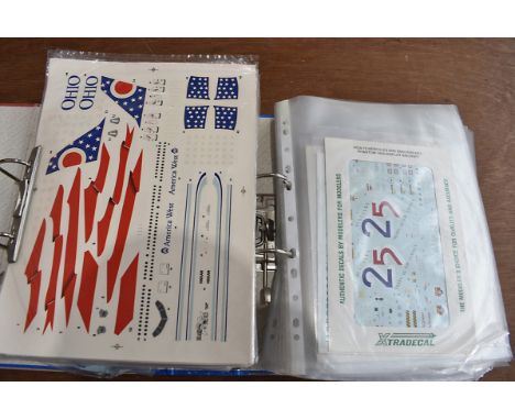 Two folders of Aeroplane model transfers/stickers, the unused livery for many aircraft models, together with a folder for the