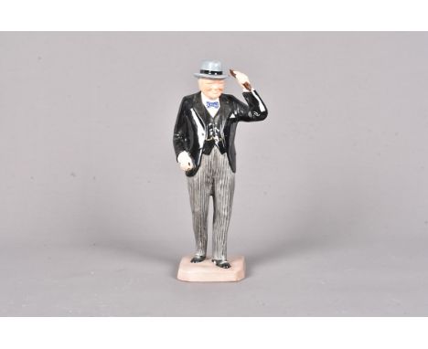 A Copeland Spode ceramic figure of Winston Churchill, Churchill with black jacket and waistcoat with grey pin striped trouser