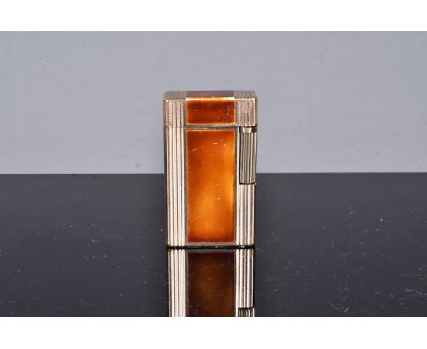 A Dupont Type D57 gas lighter, the first Dupont lighter to have special contrl valve to prevent gas escape with lid open unti