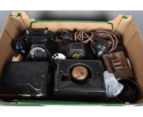 Two vintage black rotary telephones, AF, one Siemens of London, together with bell sets and other equipment (parcel)