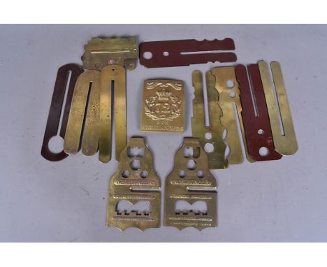 A 72nd Duke of Albany's Own Highlanders brass plate, together with a selection of button cleaners, including New Pioneer, Mil