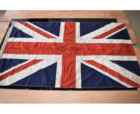 A WWI Royal Flying Corps (RFC) Union Flag, dated 1914, marked with a broad arrow, approx. 159cm x 90cm
