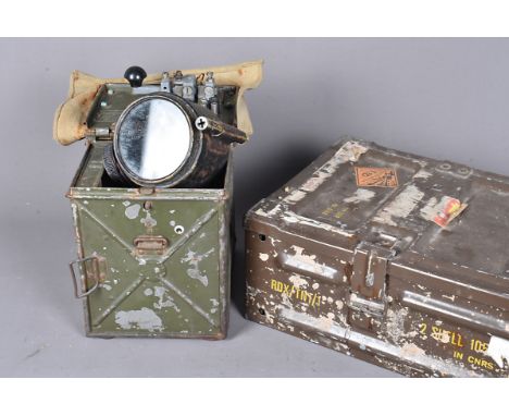 A Military cased signal lamp, together with a two shell projectile ammunition case, AF (2)