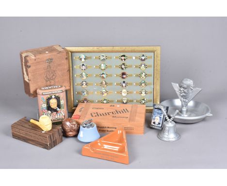 A collection of Winston Churchill related smoking items, to include a 1991 Zippo, cigar boxes, a Wedgwood table lighter, pipe