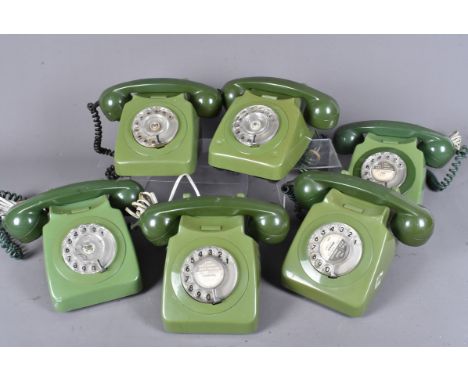 A group of six vintage green coloured rotary telephones, all complete with hand sets (6)