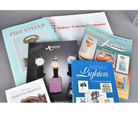 An assortment of books relating to lighters, including Fire Steels by Vittorio Cacciandra and Alessandro Cesati, Medieval Fie