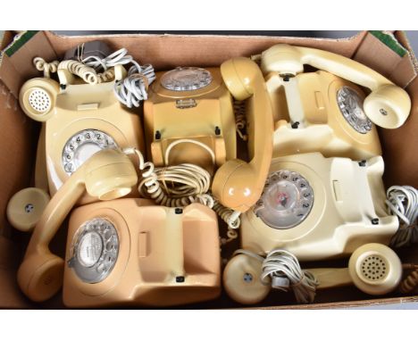 A group of five cream rotary telephones, all with their recievers (parcel)