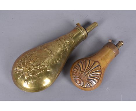 A 19th Century copper and brass powder flask, with Art Nouveau decoration, together with a 1960s replica American brass powde