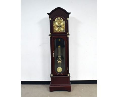 A modern longcase clock gun safe, with brass dial with moon phase style design, battery operated movement, Westminster chime,