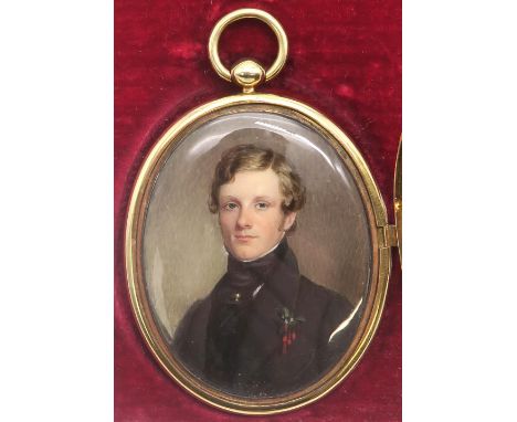 AN EARLY-VICTORIAN PORTRAIT MINIATURE LOCKET  Painted on ivory; the subject, a fair-haired gentleman wearing a dark coat and 