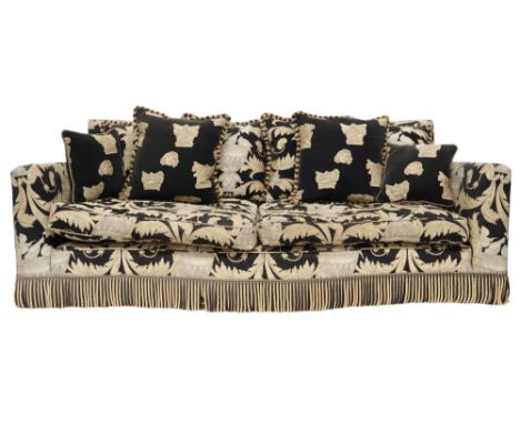 A CONTEMPORARY DURESTA "DIPLOMAT" THREE SEATER SOFA&nbsp; with down filled cushions on serpentine base with fringed valance a
