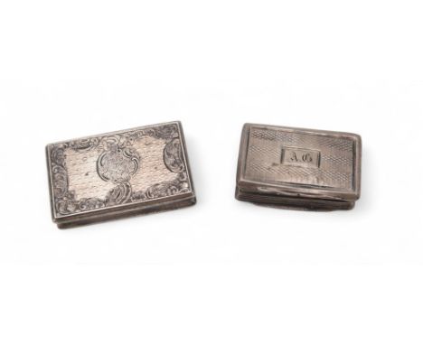 A GEORGE IV SILVER VINAIGRETTE maker's mark TS, Birmingham 1827, of rectangular form, the body with engine-turned decoration,