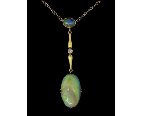 AN OPAL AND WHITE SAPPHIRE NECKLACE mounted in 9ct gold and set with an oval cabochon opal of approx 15.5mm x 9.2mm x 4.6mm. 