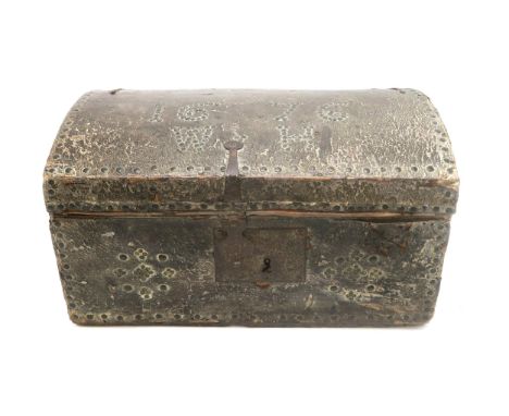 A 17th CENTURY STUDDED LEATHER DOME TOP TRUNK Of small proportions, the lid dated 1676 and initialled "WH", fitted with an ir