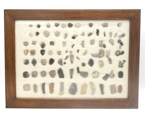 A CASED DISPLAY OF NEOLITHIC FLINT TOOLS&nbsp; Presented on a cotton wool backing, within an oak frame measuring approx. 62cm