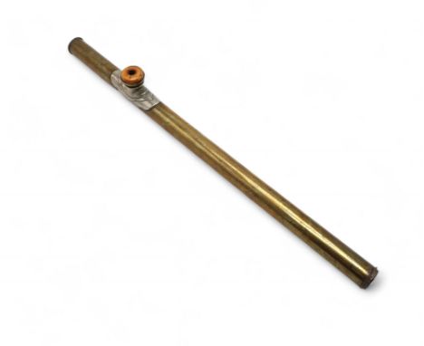A CHINESE BRASS, WHITE METAL AND IVORY OPIUM PIPE  Set with Yuan cash coin end, early 20th century, 50cm long Provenance: Ins