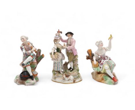 A GROUP OF MEISSEN FIGURES including after Victor Acier, a couple modelled standing with a dog at their feet, marked E 65, 17