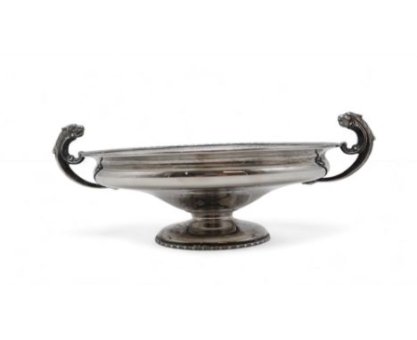 A GEORGE V SILVER COMPORT by Barker Brothers Ltd, Birmingham 1928, of circular form, with twin handles modelled as mythical c