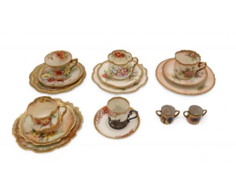 A COLLECTION OF NAUTILUS PORCELAIN TEAWARES including four trios, each painted with flowers, together with a silver mounted c