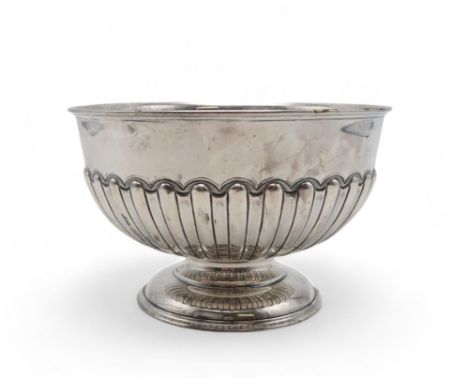 A GEORGE VI SILVER ROSE BOWL by Joseph Gloster Ltd, Birmingham 1944, of traditional form, the body half fluted, on a stepped 