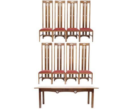 A 20TH CENTURY OAK AFTER CHARLES RENNIE MACKINTOSH DINING TABLE AND EIGHT CHAIRS  dining table with narrow rectangular top on