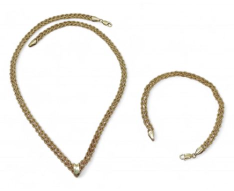 A NECKLACE &amp; BRACELET SET&nbsp; made from rope chain, with a decorative 'V' shape necklace with matching bracelet. length