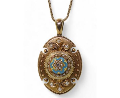 A VICTORIAN PENDANT the locket back pendant in bright yellow metal, has turquoise and white enamel detail, set with coral and