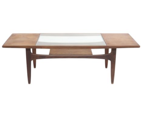 A MID 20TH CENTURY STAINED TEAK G PLAN "LONG JOHN" COFFEE TABLE&nbsp; with rectangular glass inset top over lower tiered shel