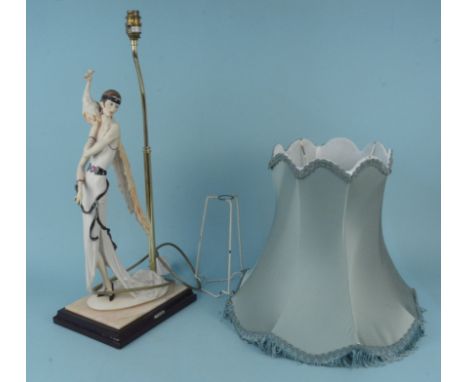 An elegant Capodimonte Naples mark female figural table lamp marked Florence to front and 1987 to rear, the figure 52cm tall 
