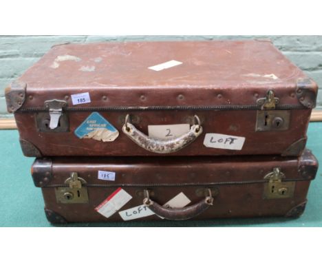 Two vintage leather bound 'The Orient' suitcase/trunks, one filled with vintage newspapers/magazines, the other with early 20