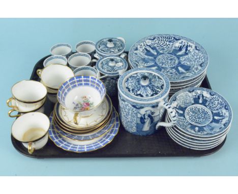 A vintage Chinese blue and white part tea service, five cups and six saucers, six plates, teapot, milk and sugar (two chips o