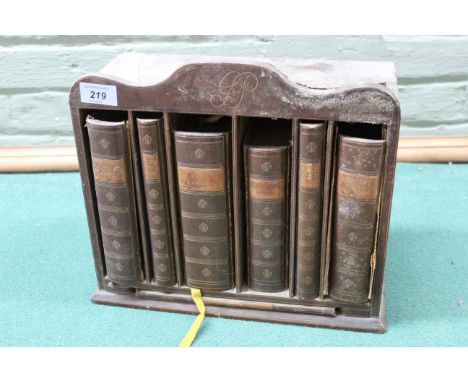 A late 19th Century leather cased book carriage, consisting of 'Bradshaws Guide', 'Post Office Guide' plus others