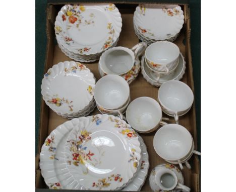 An extensive collection of Haviland &amp; Co Limoges tea wares including four oval plates, eight side plates, twelve cups and