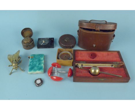A small box of mixed items to include a 'Newlight' combined cigarette case, lighter and compact, Barr &amp; Stroud binoculars