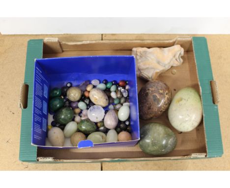 A quantity of alabaster and marble eggs, crystals etc plus a carved terracotta architectural fragment