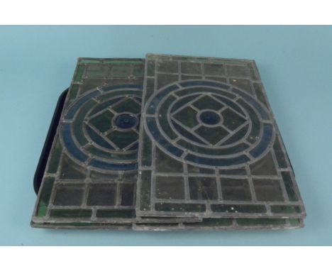 Four vintage leaded glass panels, 44cm x 26cm (odd breaks in glass)