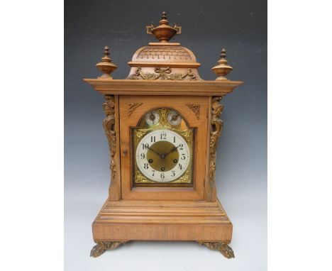 A LARGE JUNGHANS WESTMINSTER CHIME MANTLE CLOCK, the architectural case having mahogany veneers, cast brass furniture and gla
