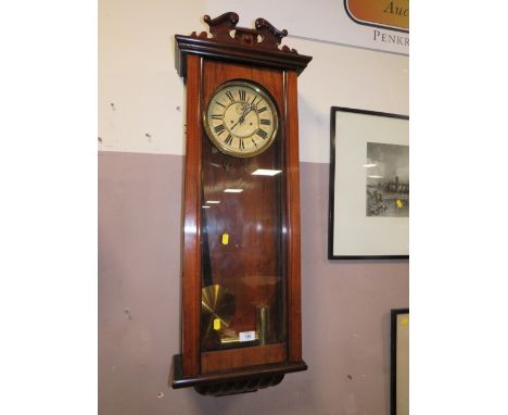 AN ANTIQUE VIENNA TWIN WEIGHT CLOCK - PENDULUM