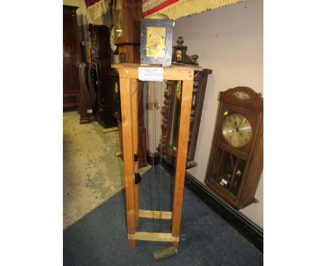 A CLOCK REPAIR FRAME WITH CLOCK MOVEMENT
