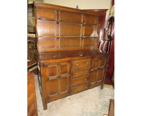 A DARK OAK ERCOL STYLE DRESSER