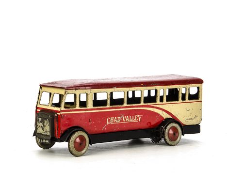 A Chad Valley Tinplate clockwork Single Deck Bus, in cream and red with wire clockwork drive, F, scratches and general play w