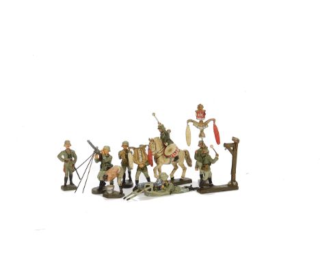 Elastolin and Lineol 75mm German WW2 infantry figures, mainly marching, with Lineol mounted kettle drummer and schellenbaum, 