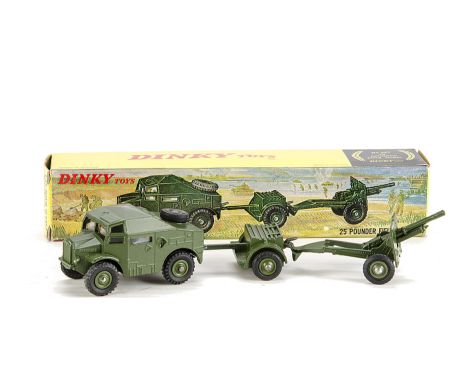 A Dinky Toys 697 25 Pounder Field Gun Set, comprising Field Artillery Tractor, Trailer and Gun, all green body, plastic hubs,