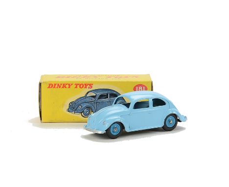 A Dinky Toys 181 Volkswagen Saloon, pale blue body, mid-blue plastic hubs, matt black base, in original lighter yellow pictur